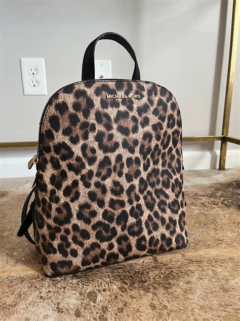 michael kors black leopard backpack|michael kors black camo backpack.